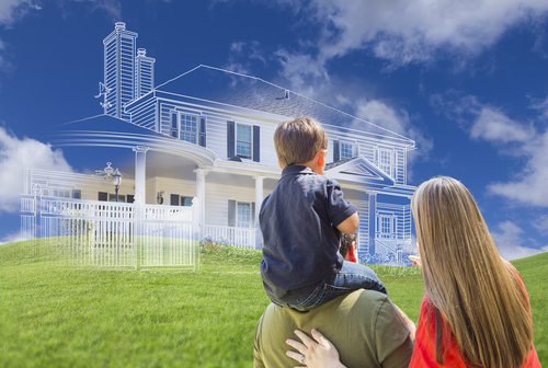 Young,family,facing,ghosted,house,drawing,,partial,photo,and,rolling